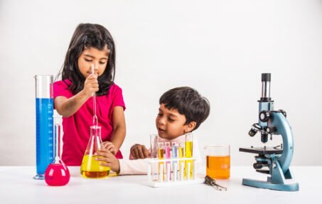 Young children doing a science experiment